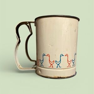 Vintage Androck metal flour sifter geese design